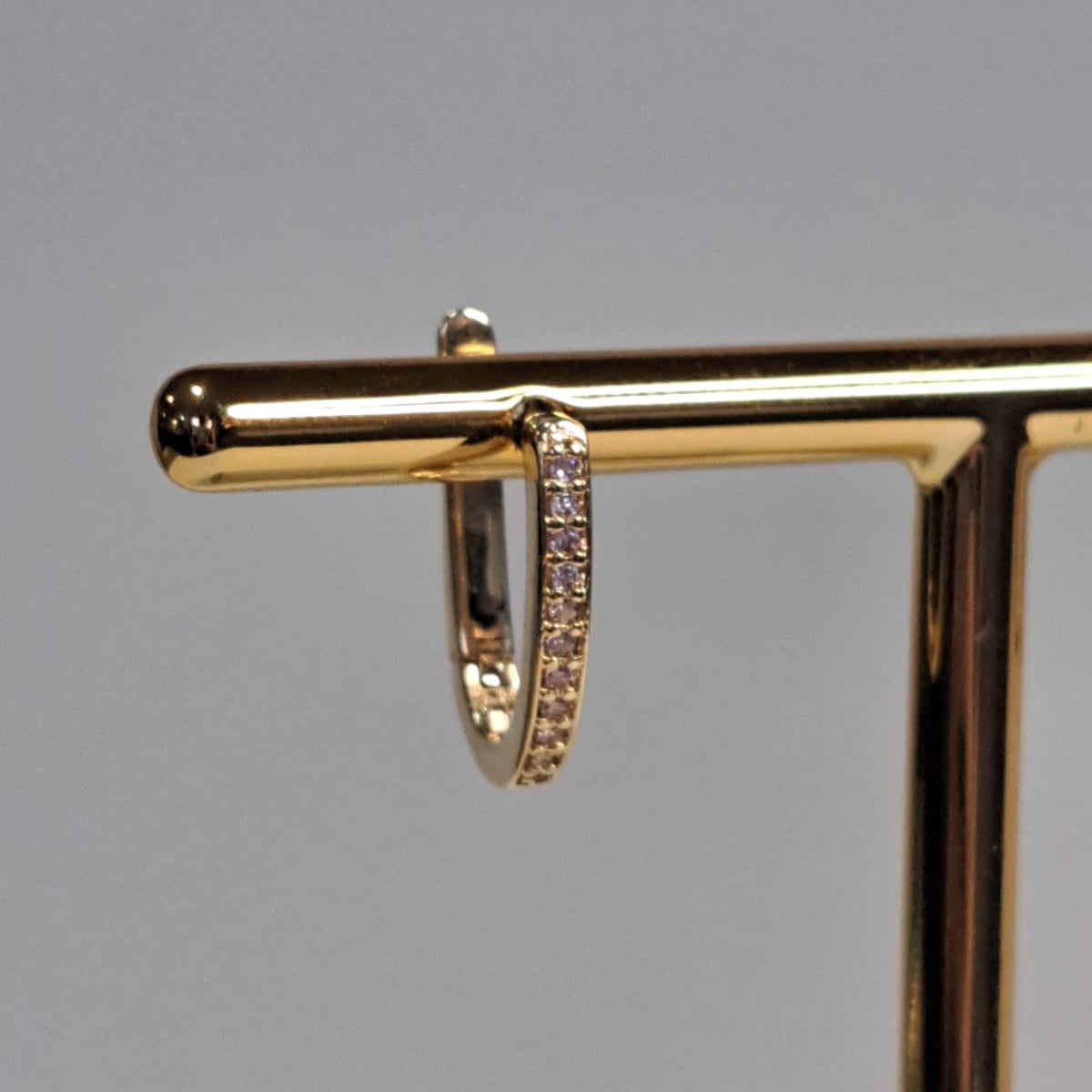 Brinco Infantil Argola em U Zircônias Champanhe